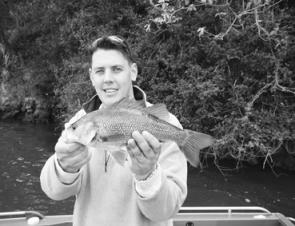 Brandon Heagney from Tackle World Southport with a nice bass caught on a deep-diving Jackall Chubby .
